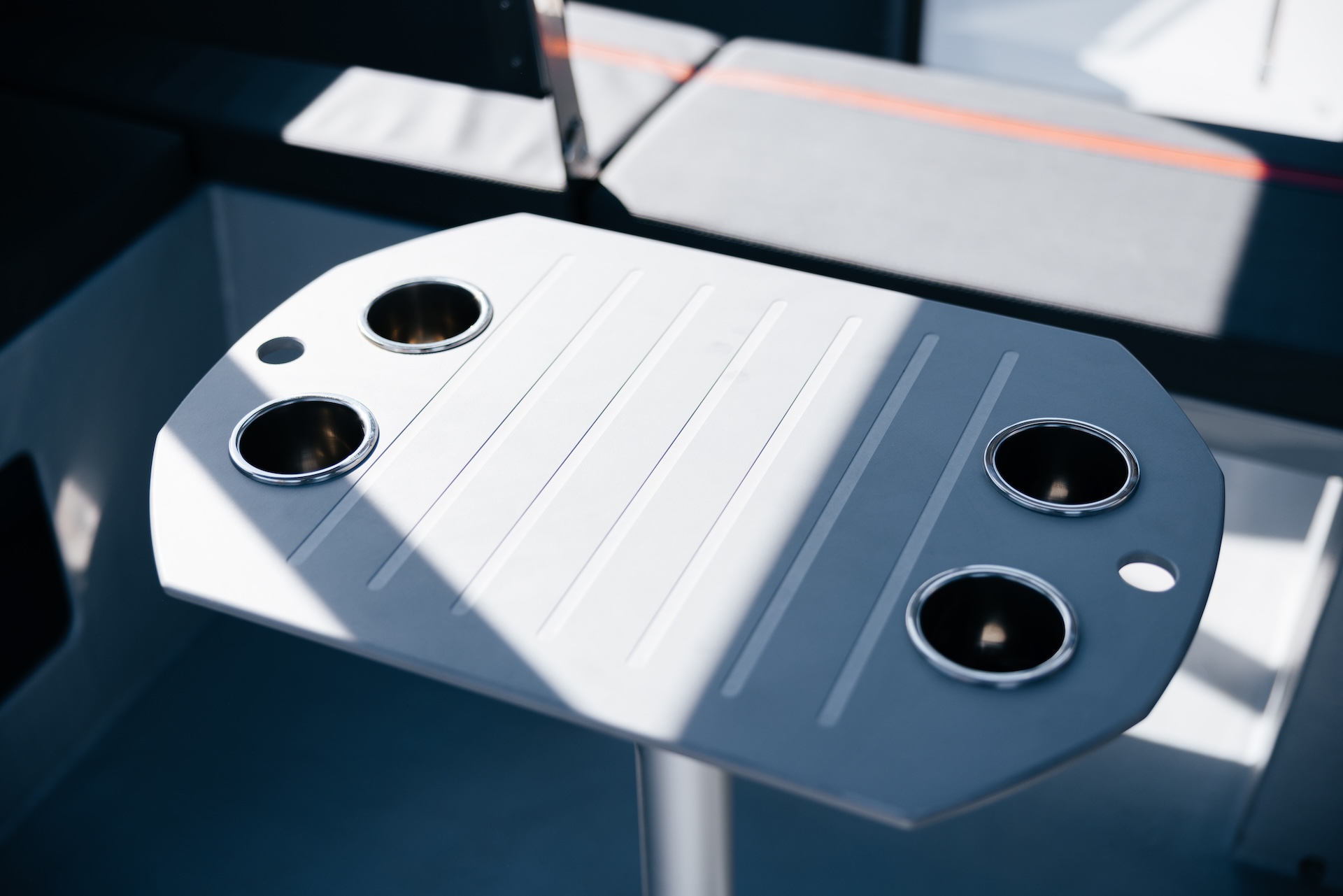 a metal table with four holes